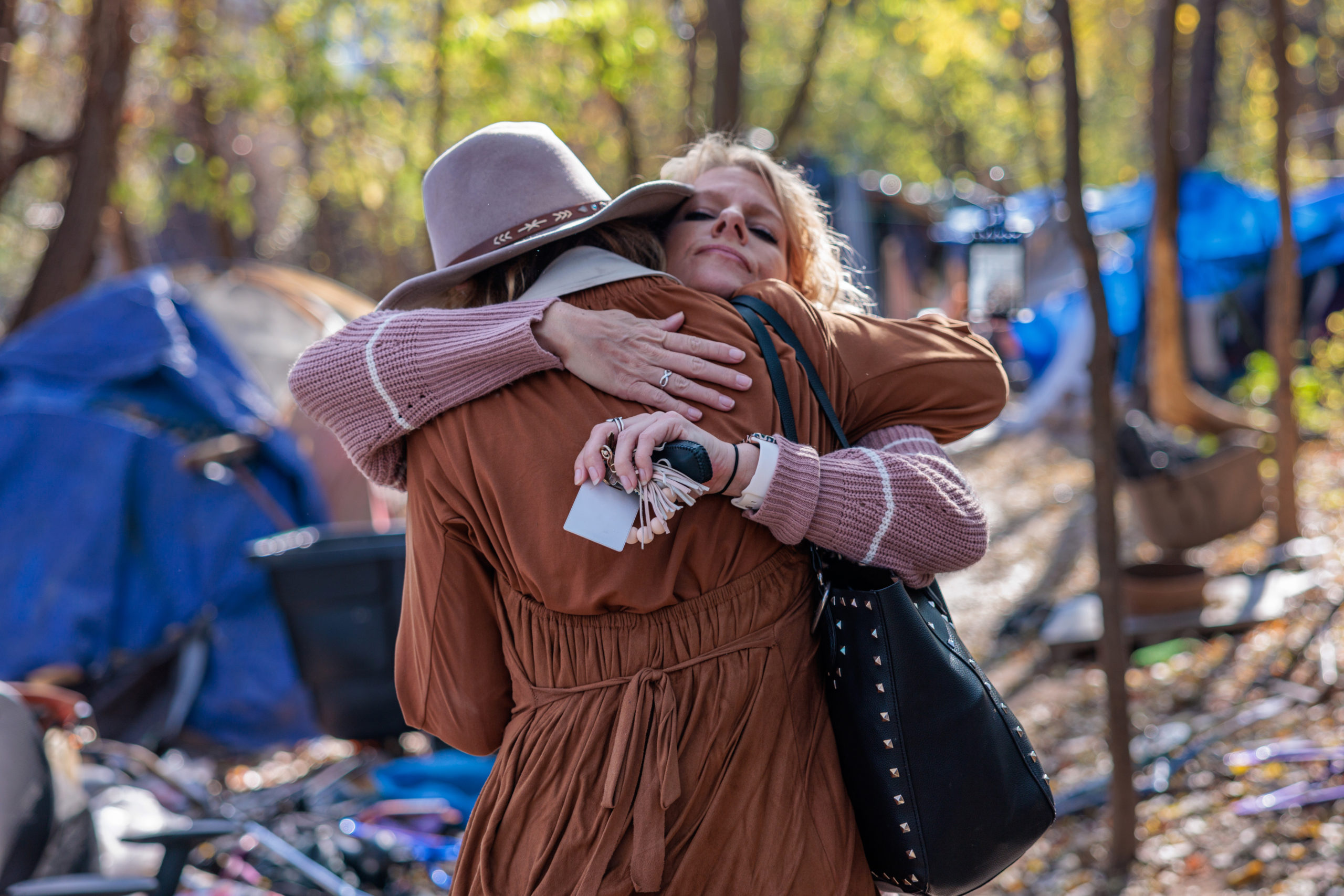 two women hugging each other