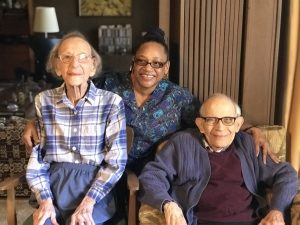Family Eldercare team member with two elders