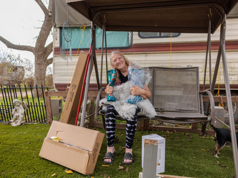Person on a swing with gifts they received